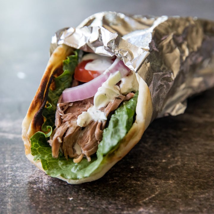 Urban Bites halal wrap with lettuce, tomato, onion and garlic sauce